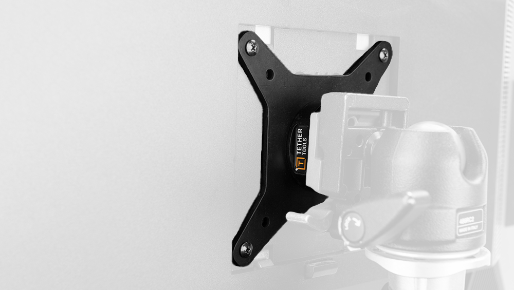 Wall-mounted VESA monitor bracket attached to a wall, ready to hold a flat-screen display