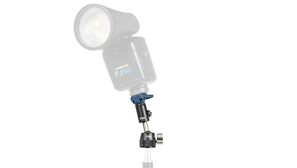Westcott FJ80 studio flash head mounted on a light stand with accessories for a photography setup