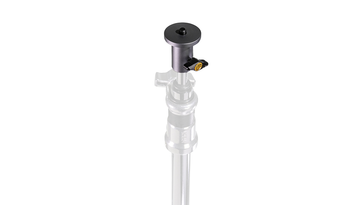 Close-up of a small black quick-release camera mount attached to a vertical pole, isolated on white background.