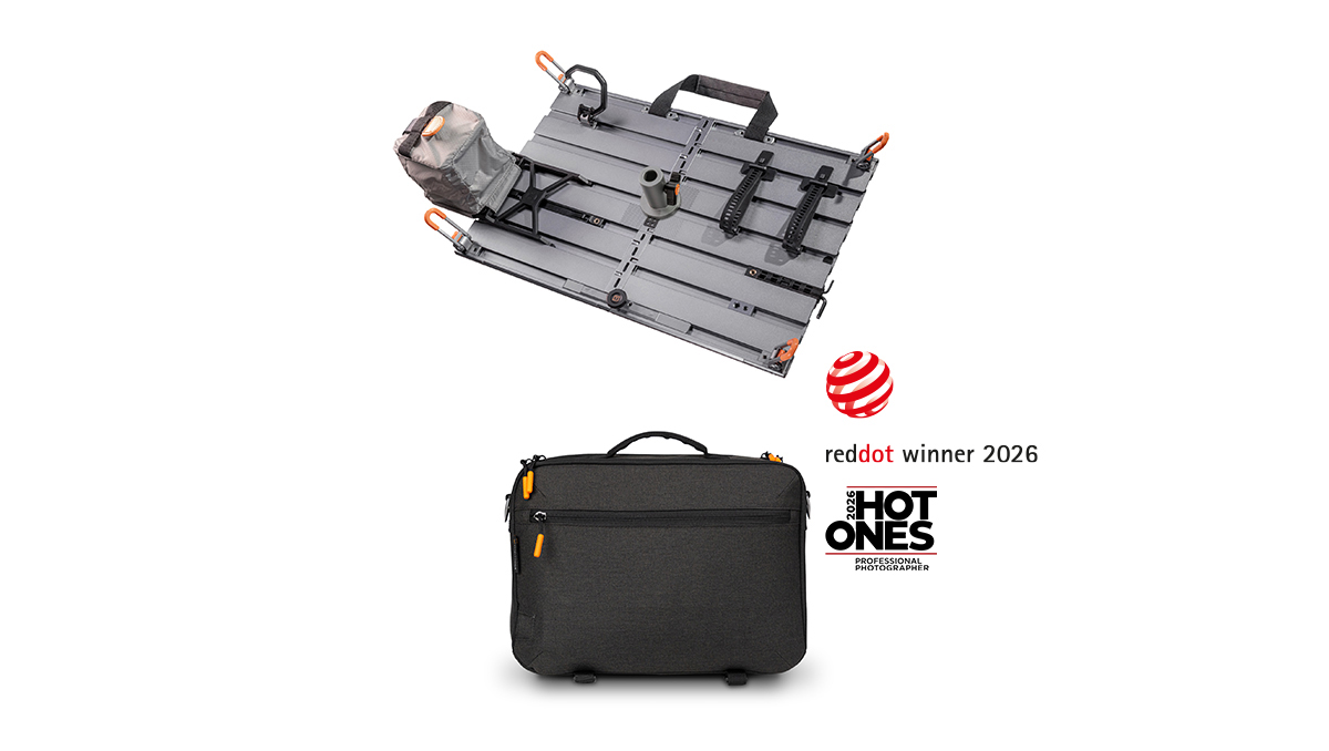 Modular camera rig on a wheeled cart above a black camera bag; Red Dot 2026 and HOT ONES award logos nearby.