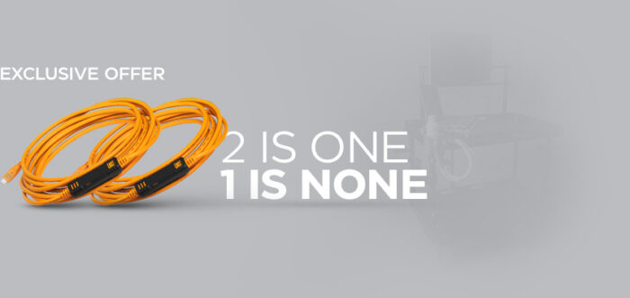Orange coiled ethernet cables on a gray banner with 'EXCLUSIVE OFFER' and bold '2 IS ONE 1S NONE' promo text on the right.